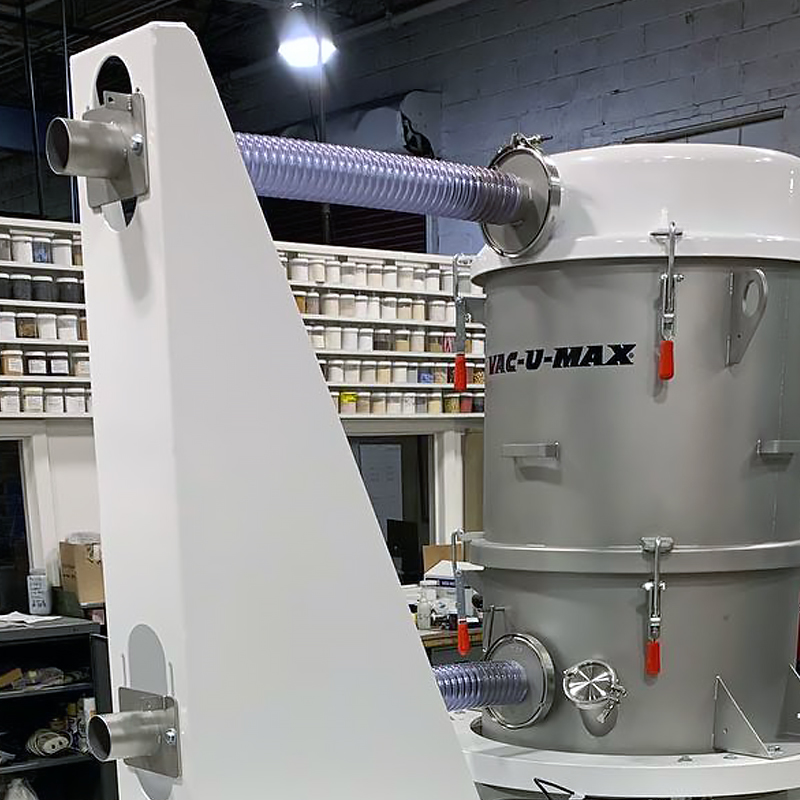 22” diameter batch-weigh receiver with offset cone hopper and 10” wafer valve. Inlet/outlet hose support isolates receiver for high-accuracy weighing.