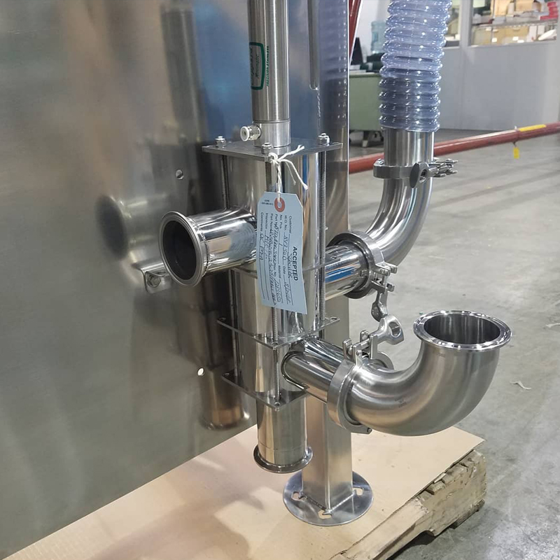 Sanitary low-pressure valve detail on a floor-standing blender loader filter assembly